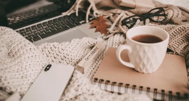 Cozy workspace with tea and notebook